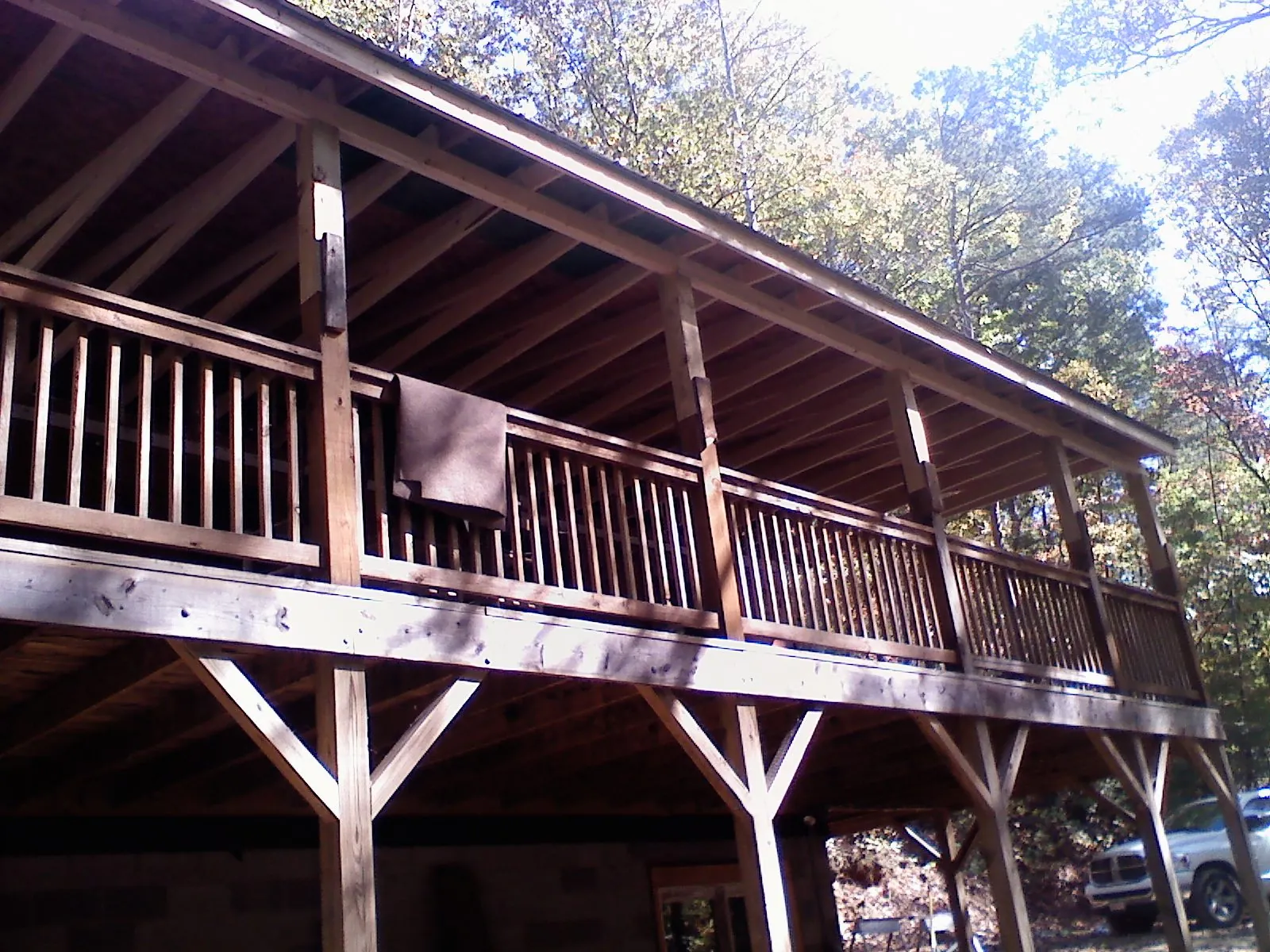 Timber framing under a new elevated porch and deck — Roof Leak Repair in Winnie by Roofing Brothers